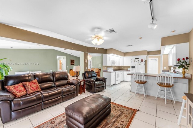 8620 SW 181st St, Palmetto Bay, FL 33157 - living room with light tile patterned floors and ceiling fan