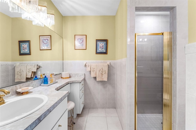 8620 SW 181st St, Palmetto Bay, FL 33157 - full bath with tile walls, a shower stall, vanity, tile patterned floors, and a chandelier