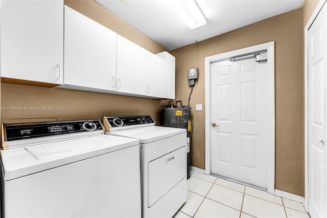 8620 SW 181st St, Palmetto Bay, FL 33157 - laundry room featuring electric water heater, washer and dryer, cabinet space, baseboards, and light tile patterned floors