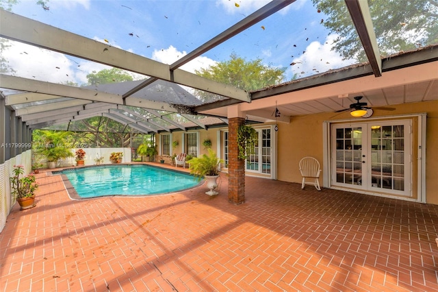 8620 SW 181st St, Palmetto Bay, FL 33157 - view of swimming pool with a patio, a ceiling fan, a lanai, and french doors