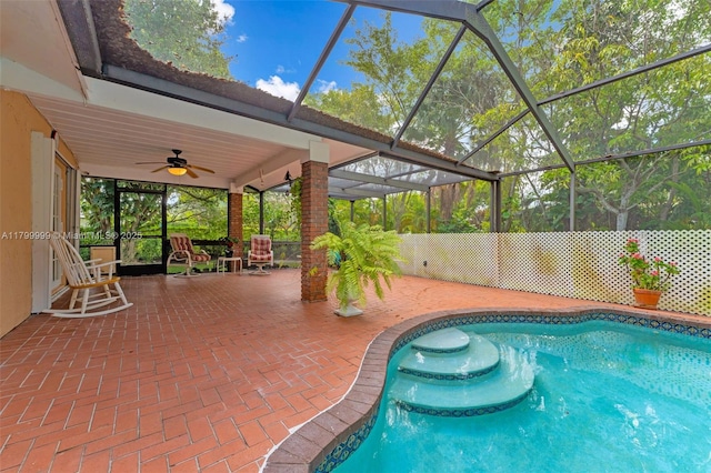 8620 SW 181st St, Palmetto Bay, FL 33157 - view of pool with ceiling fan, a patio area, and a lanai
