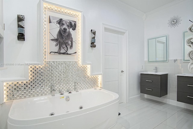 full bath featuring crown molding, vanity, and a jetted tub