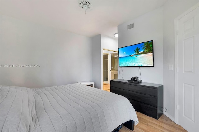 23158 Island Vw Unit 1, Boca Raton, FL 33433 - bedroom featuring light wood finished floors and ensuite bathroom