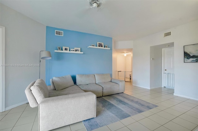 23158 Island Vw Unit 1, Boca Raton, FL 33433 - living area featuring tile patterned flooring and baseboards
