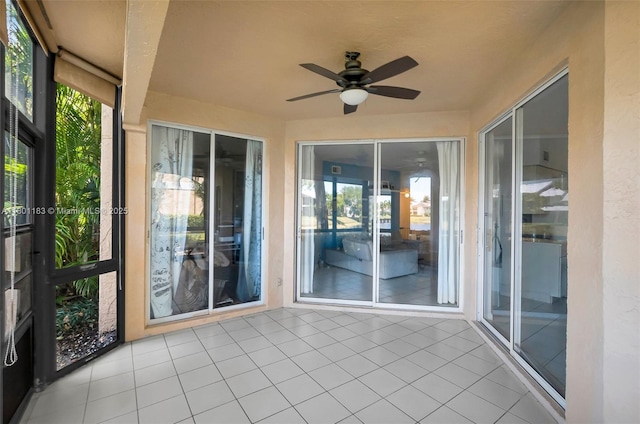 23158 Island Vw Unit 1, Boca Raton, FL 33433 - unfurnished sunroom featuring ceiling fan and tile patterned floors