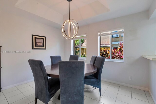 23158 Island Vw Unit 1, Boca Raton, FL 33433 - dining space with baseboards, a chandelier, and light tile patterned floors