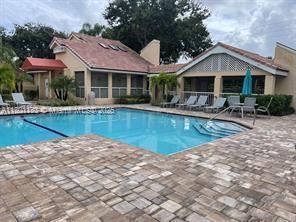 23158 Island Vw Unit 1, Boca Raton, FL 33433 - community pool featuring a patio