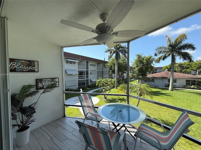 400 SE 10th St Unit 214, Deerfield Beach, FL 33441 - sunroom with ceiling fan