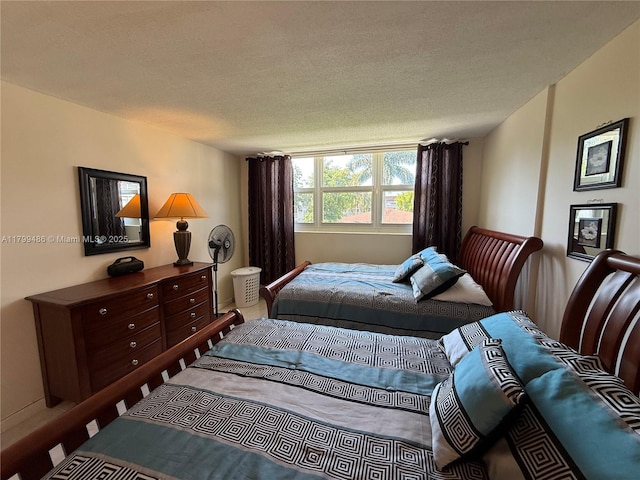 400 SE 10th St Unit 214, Deerfield Beach, FL 33441 - bedroom featuring a textured ceiling