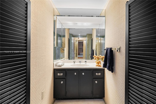 11111 Biscayne Blvd Unit 227, Miami, FL 33181 - bathroom featuring a textured wall and vanity