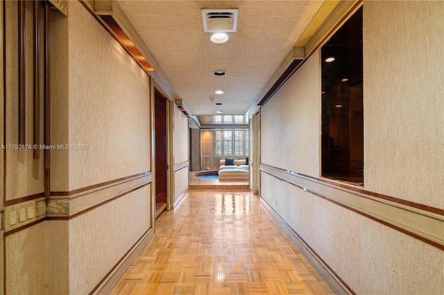 11111 Biscayne Blvd Unit 227, Miami, FL 33181 - hall with a textured wall, recessed lighting, and baseboards