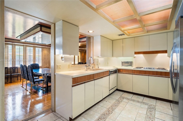 11111 Biscayne Blvd Unit 227, Miami, FL 33181 - kitchen with a sink, dishwasher, freestanding refrigerator, cooktop, and light countertops