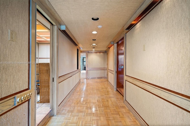11111 Biscayne Blvd Unit 227, Miami, FL 33181 - corridor with a textured ceiling and a textured wall