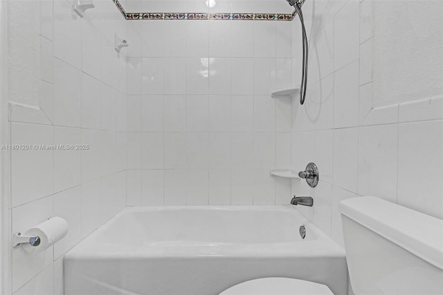 full bath featuring tile walls, toilet, and bathtub / shower combination