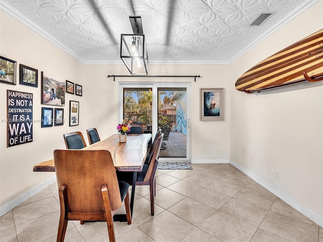 5119 Hayes St, Hollywood, FL 33021 - dining area with an ornate ceiling, light tile patterned floors, baseboards, and crown molding