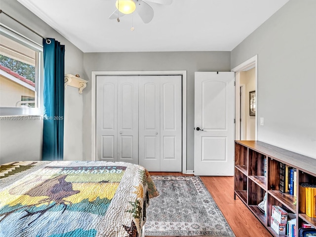 5119 Hayes St, Hollywood, FL 33021 - bedroom with a closet, wood finished floors, and a ceiling fan