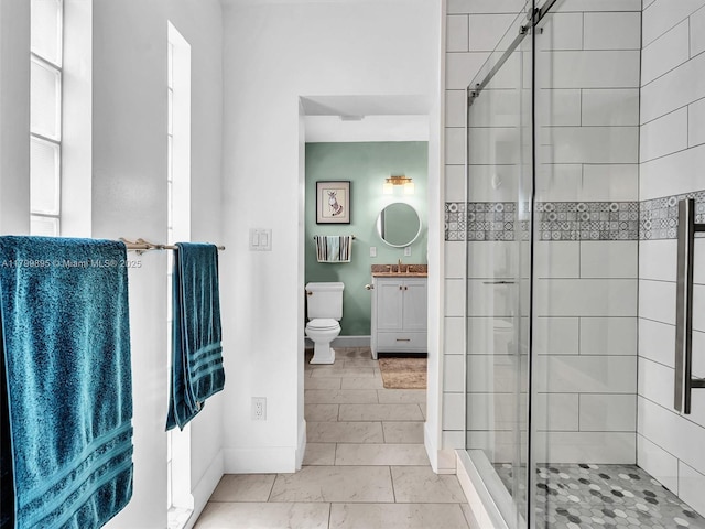 5119 Hayes St, Hollywood, FL 33021 - full bathroom featuring toilet, a shower stall, vanity, and baseboards