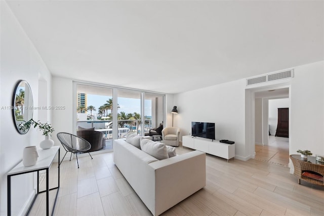 2751 S Ocean Dr Unit 403S, Hollywood, FL 33019 - living room with expansive windows
