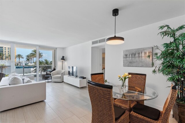 2751 S Ocean Dr Unit 403S, Hollywood, FL 33019 - dining area featuring expansive windows