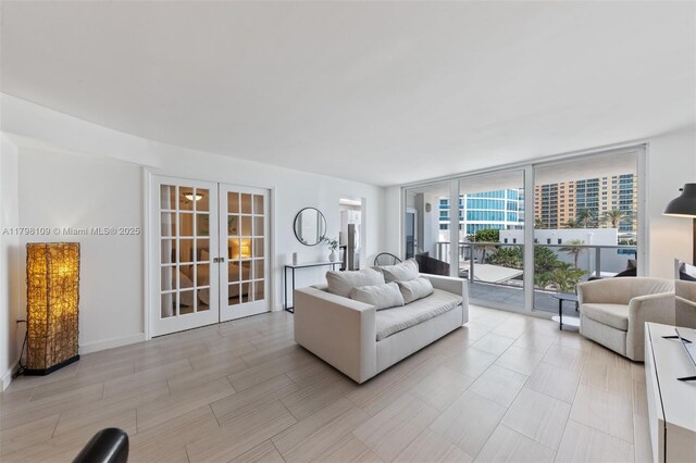 2751 S Ocean Dr Unit 403S, Hollywood, FL 33019 - living area with french doors and expansive windows