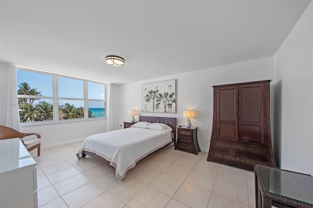 2751 S Ocean Dr Unit 403S, Hollywood, FL 33019 - bedroom with light tile patterned floors and baseboards