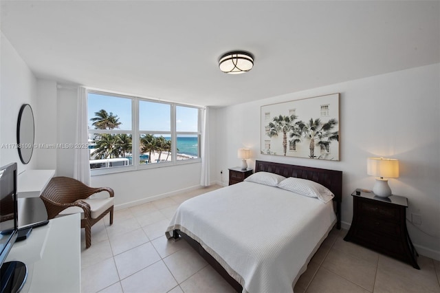 2751 S Ocean Dr Unit 403S, Hollywood, FL 33019 - bedroom featuring light tile patterned flooring and baseboards