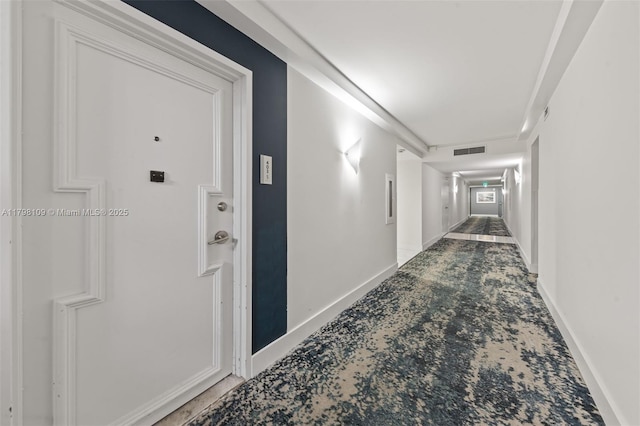 2751 S Ocean Dr Unit 403S, Hollywood, FL 33019 - hallway with light carpet and baseboards