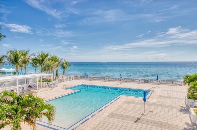 2751 S Ocean Dr Unit 403S, Hollywood, FL 33019 - community pool featuring a water view, fence, and a patio area