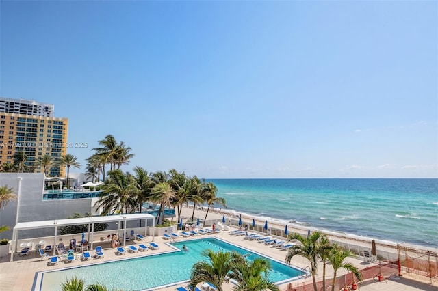 2751 S Ocean Dr Unit 403S, Hollywood, FL 33019 - community pool with view of water and beach and a patio
