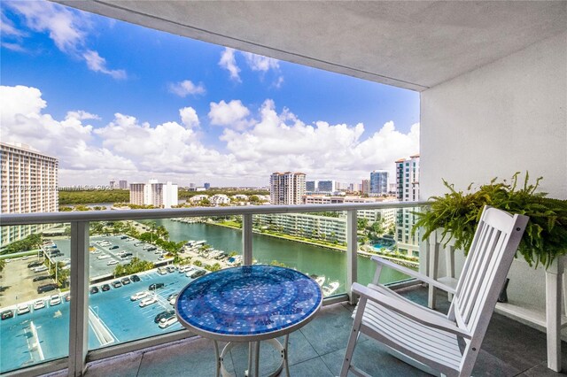 100 NW Bayview Dr Unit 1502, Sunny Isles Beach, FL 33160 - balcony with a water view and a view of city