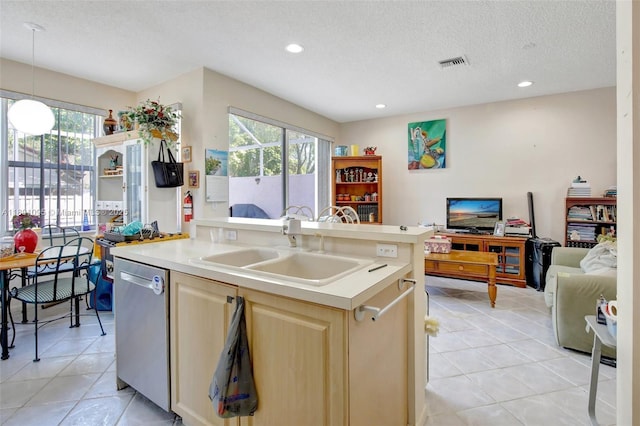 1562 NW 157th Ave, Pembroke Pines, FL 33028 - kitchen with dishwasher, open floor plan, a sink, light countertops, and light tile patterned flooring