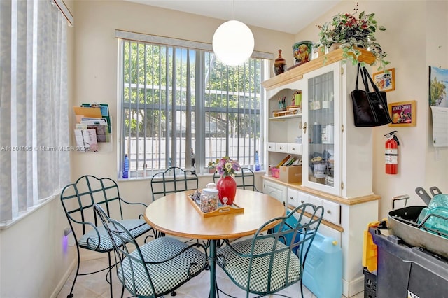 1562 NW 157th Ave, Pembroke Pines, FL 33028 - dining room featuring healthy amount of natural light and baseboards