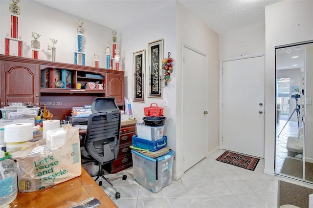 1562 NW 157th Ave, Pembroke Pines, FL 33028 - entryway featuring light tile patterned flooring and a textured ceiling