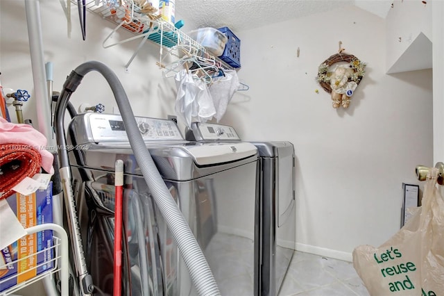 1562 NW 157th Ave, Pembroke Pines, FL 33028 - laundry room featuring washing machine and clothes dryer, baseboards, and marble finish flooring