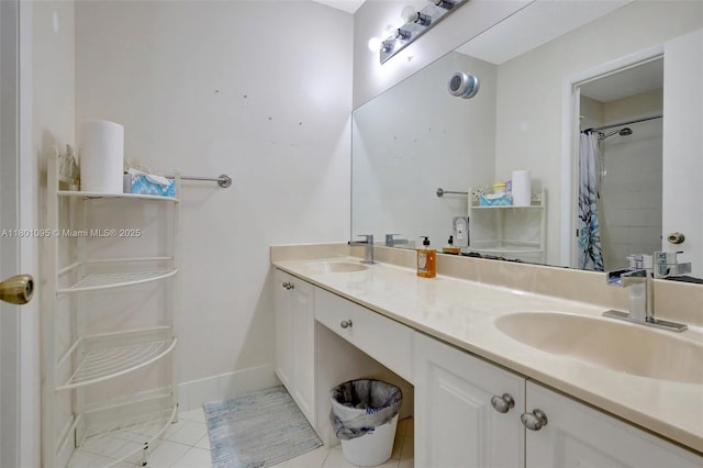 1562 NW 157th Ave, Pembroke Pines, FL 33028 - full bathroom with tile patterned flooring, double vanity, and baseboards