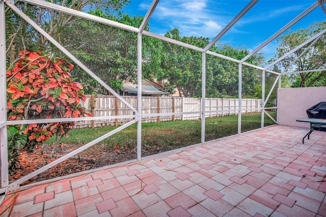 1562 NW 157th Ave, Pembroke Pines, FL 33028 - view of patio / terrace with a fenced backyard and glass enclosure