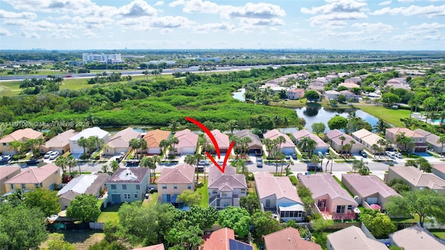 1562 NW 157th Ave, Pembroke Pines, FL 33028 - aerial view of residential area with a large body of water