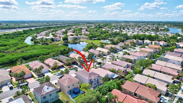 1562 NW 157th Ave, Pembroke Pines, FL 33028 - aerial view of residential area featuring a large body of water