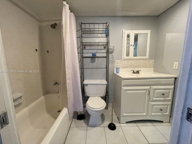 bathroom featuring tile patterned floors, toilet, shower / tub combo with curtain, and vanity