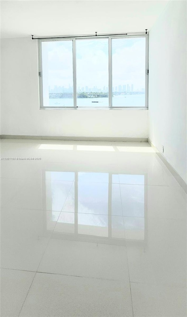 1000 W Ave Unit 715, Miami Beach, FL 33139 - spare room featuring healthy amount of natural light