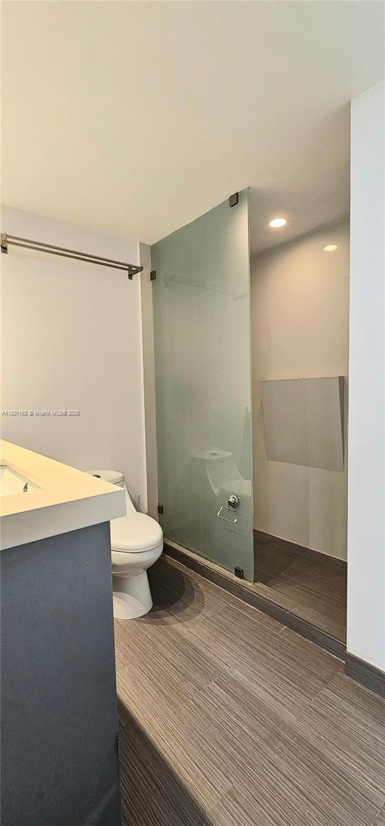 1000 W Ave Unit 715, Miami Beach, FL 33139 - full bath with toilet, vanity, a shower, and recessed lighting