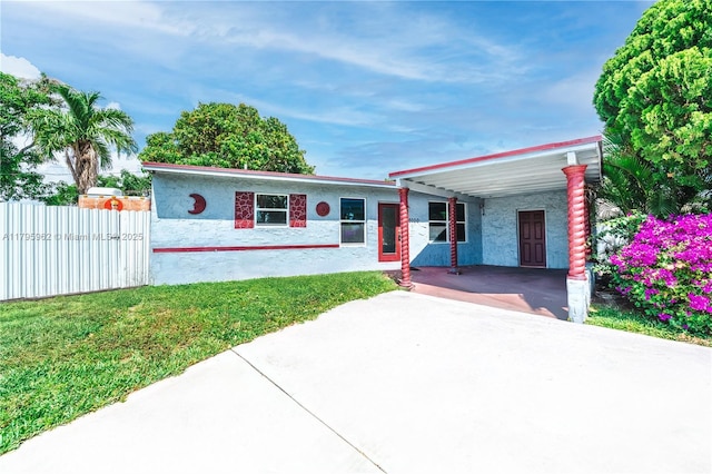 18000 NW 6th Pl, Miami Gardens, FL 33169 - view of front of home featuring concrete driveway, an attached carport, and stucco siding