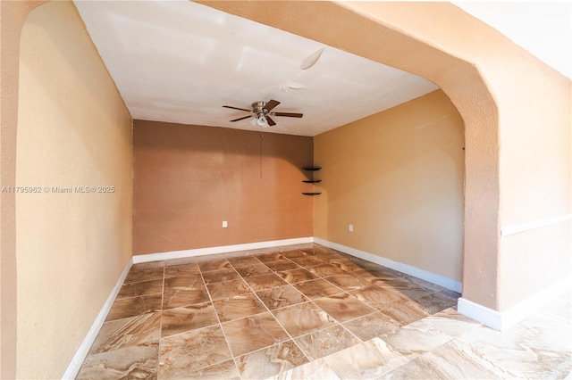 18000 NW 6th Pl, Miami Gardens, FL 33169 - unfurnished room featuring ceiling fan, baseboards, and arched walkways