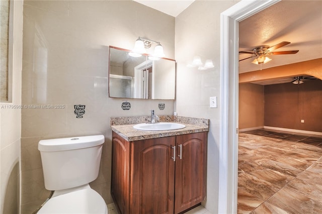 18000 NW 6th Pl, Miami Gardens, FL 33169 - bathroom with toilet, ceiling fan, and vanity
