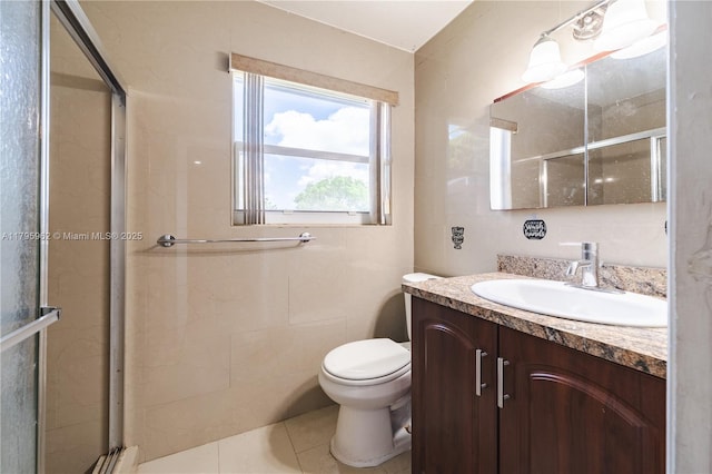 18000 NW 6th Pl, Miami Gardens, FL 33169 - bathroom featuring a stall shower, vanity, toilet, and tile patterned floors