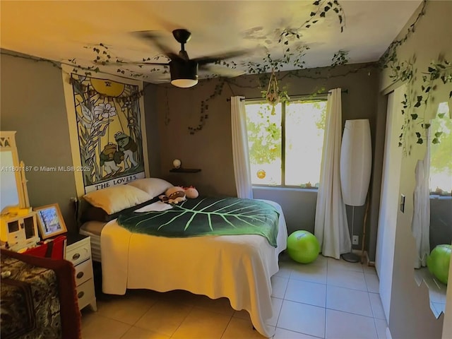 bedroom featuring tile patterned flooring