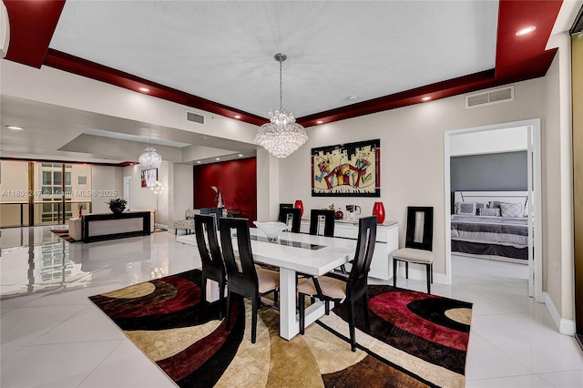 16275 Collins Ave Unit 2002, Sunny Isles Beach, FL 33160 - tiled dining room featuring a tray ceiling, baseboards, a chandelier, and recessed lighting