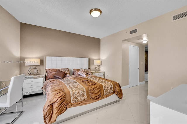 16275 Collins Ave Unit 2002, Sunny Isles Beach, FL 33160 - bedroom with light tile patterned floors and baseboards