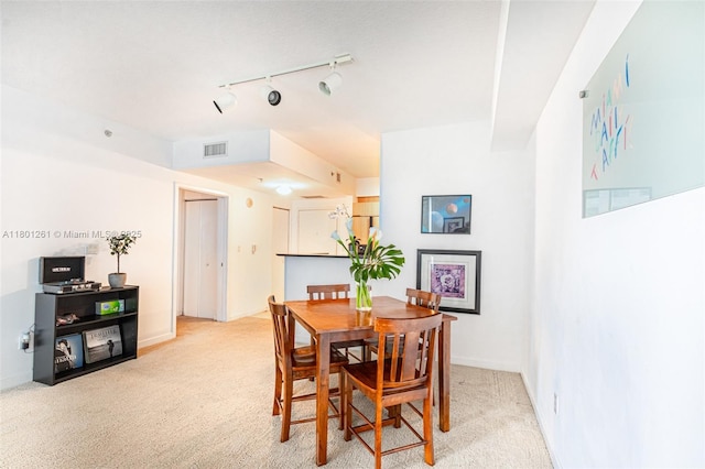 335 S Biscayne Bl Unit 902, Miami, FL 33131 - dining space with light carpet and rail lighting