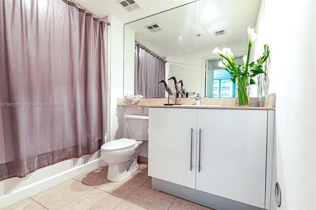 335 S Biscayne Bl Unit 902, Miami, FL 33131 - full bath with toilet, tile patterned floors, vanity, and shower / bath combination with curtain
